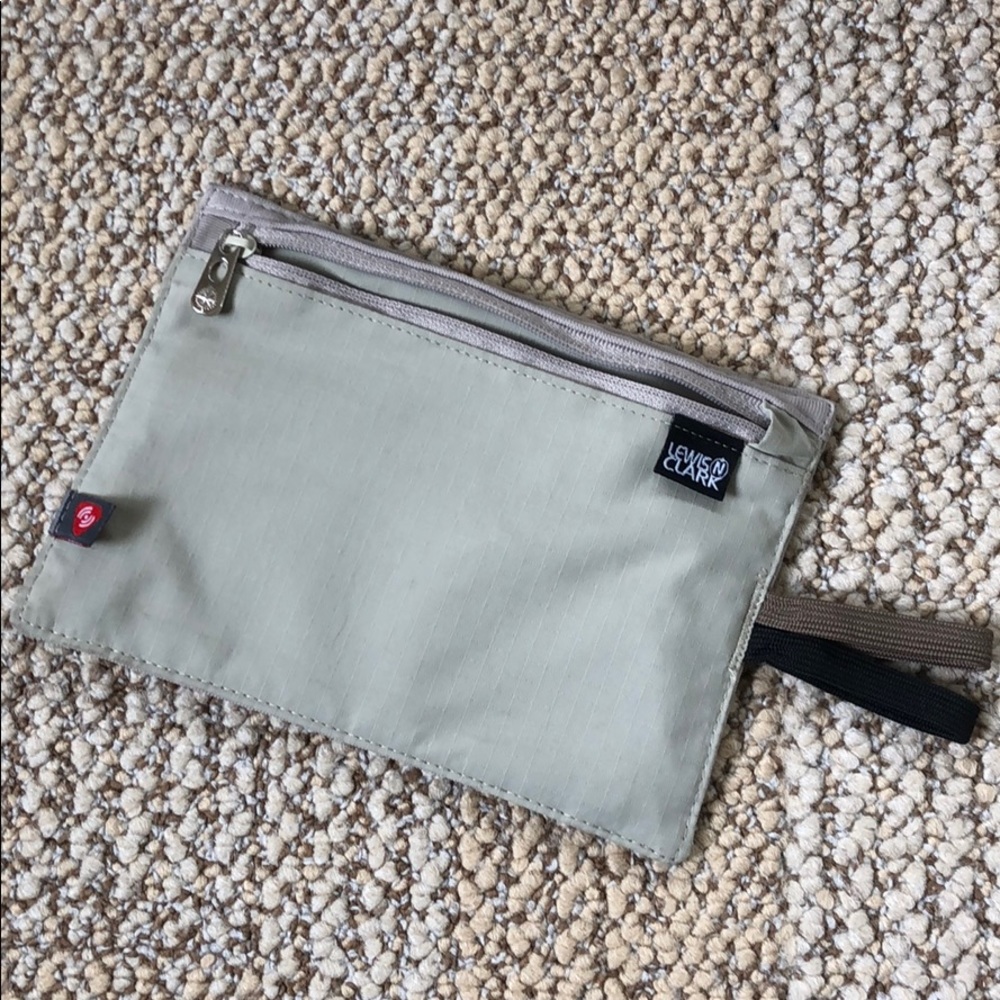 Travel wallet with belt loops.